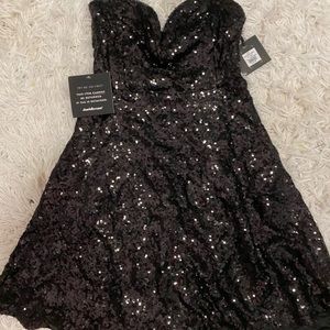 Strapless black sparkly dress